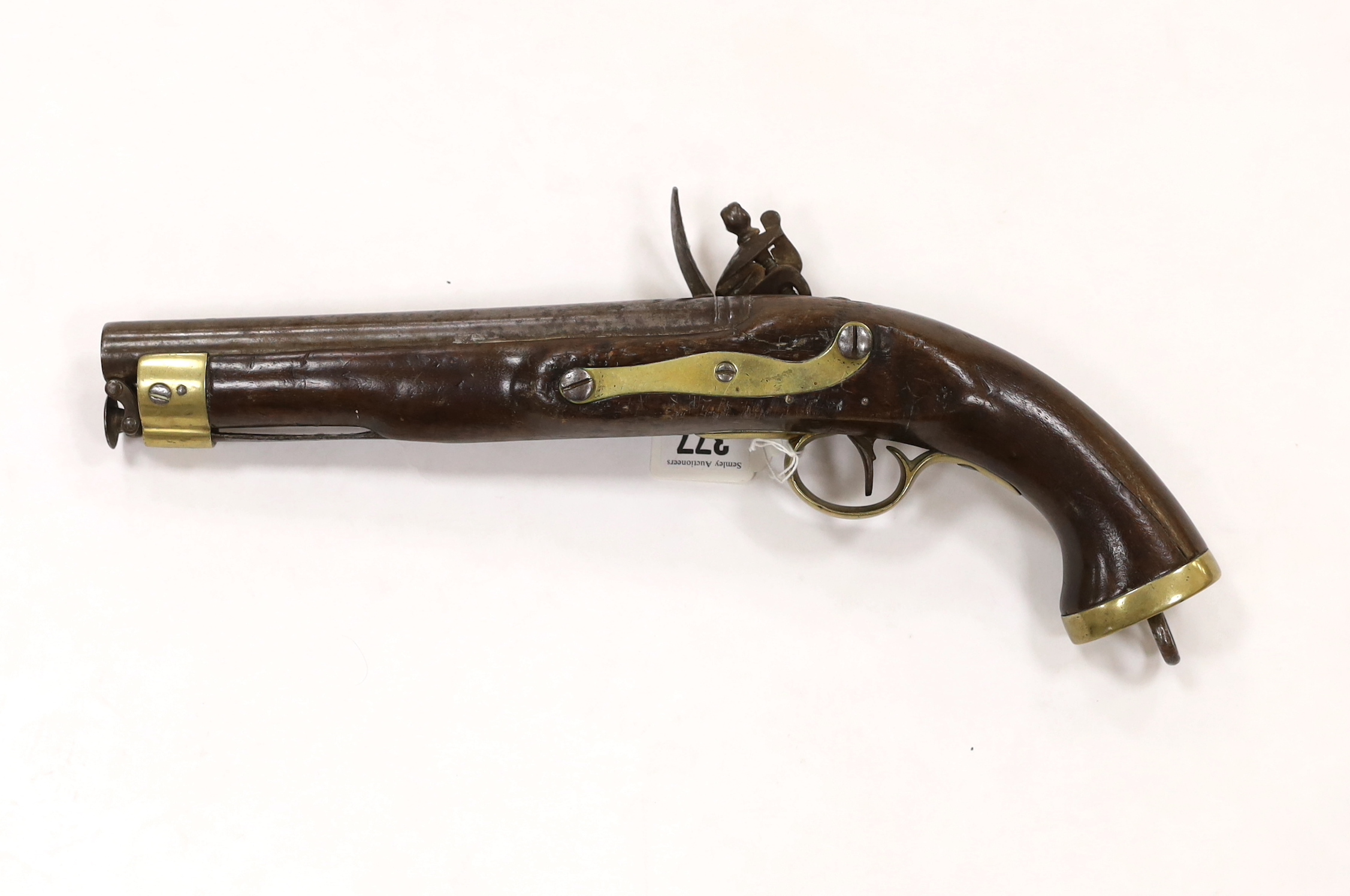 A 16 bore East India Company flintlock pistol, 9” barrel, London proof marks, regulation brass mounts and lock with EIC lion rampant, and fitted with iron lanyard with swivel ram rod